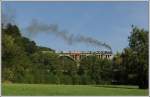 Kh101 mit dem Dampfbummelzug von Weiz nach Birkfeld am 23.8.2013 bei der Querung des 276m langen Grub-Viadukt.