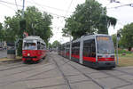 Wien Wiener Linien SL 49 (E1 4540 (Bombardier-Rotax 1975) + c4 1370 (Bombardier-Rotax 1977)) / SL 6 (B1 748) XV, Rudolfsheim-Fünfhaus, Neubaugürtel / Mariahilfer Straße am 28.