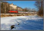 DB 101 233 mit EC 216 von Graz nach Saarbrcken beim Schloss Trautenfels, 9.2.2011