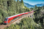 1116 228-8 schiebt den railjet 898 (Linz Hbf - Salzburg Hbf - Klagenfurt Hbf) über das Hundsdorfer-Viadukt bei Bad Hofgastein.