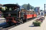 Zahnradlok Nr 2 “Jenbach” (Wiener Lokomotivfabrik Floridsdorf, Baujahr 1889) der Achsenseebahn mit Regionalzug R3 Jenbach-Achensee Schiffsstation auf Bahnhof Jenbach am 2-8-2013.