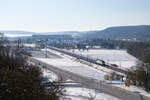 183 717 STB mit einem Milsped Autotransportzug bei Himmelstadt Richtung Gemünden, 12.02.2021