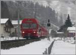 steuerwagen RE1040 aus Davos Platz mit Steuerwagen 1755 zwischen Gr�sch und Seewis-Valzeina. (10.02.2010)