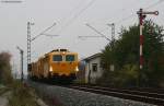 Stopfmaschinen Eine Unimat 4s (Stopfmaschine) von Plasser & Theurer mit weiteren Baufahrzeugen der BAHNBauGruppe an der Bk Basheide 29.10.09.Viele Gr��e an den Tf!