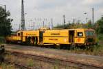 Stopfmaschinen Die 08-275 3S von Eiffage Rail (ehemals Heitkamp Rail) sonnt sich an der alten Ladestra�e in Wanne-Eickel. 30.6.2010