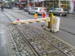 Diese Schranke sch�tzt die Einfahrt zur Strassenbahnlinie in Gent. Kommt ...
