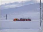 strecke-berninabahn-sm-ti ABe 4/4 43 zieht mit dem R�umer 9132 den Schnee in die Gleismitte f�r die nachfolgende Schleuder. Ospizio Bernina (12.01.2010)