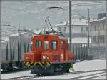Im nebelverhangenen Tirano verrichtet Ge 2/2 162 am 24.12.09 wacker ...