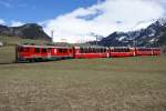 strecke-berninabahn-sm-ti Der BEX 955 n�hert sich am 28.3.10 Poschiavo. Gezogen, oder in diesem Fall gebremst, wurde er vom ABe 4/4 III 56.