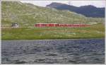 strecke-berninabahn-sm-ti R1656 mit ABe 8/12 3502 'Friedrich Hennings' am Lej Pitschen auf der Nordseite des Berninapasses. (14.07.2010)