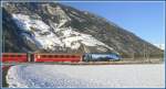 RE1144 mit Ge 4/4 III 647 Gr�sch vor der Schiessplatzhalde ...