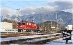 strecke-rheintal-lq-rei Ge 6/6 II 706 'Disentis/Must�r' mit G�terzug in Ems Werk. (03.02.2010)