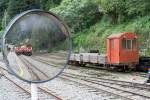 AFR Flachwagen mit Kabine 6027 und (im Spiegel) DL48 und DL46 am 06.Juni 2014 in der Fenchihu Station.