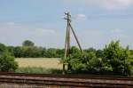 Telegrafenleitungen 'Isn't it romantic?' hie� schon in den 1950-ziger Jahren ein Schlager, ich glaube von Bing Crossby......selbe Frage 2010.......wie anno Dazumal ziehen sich die alte Telegrafenleitung neben der Erfttalbahn zwischen Holzheim und Grevenbroich her. 23.5.2010 ist das Aufnahme Datum