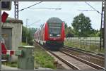 Ein RE2 Rhein-Haard-Express rollt beim Halterner Stausee dem Zielbahnhof Münster ... Ein RE2 Rhein-Haard-Express rollt beim Halterner Stausee dem Zielbahnhof Münster ...