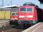 Die 111-117, die gerade mit dem RE 4 aus Aachen ...