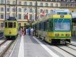 TN Transport Publics du Littoral Neuchatelois TN - Triebwagen Be 4/4 501 + Steuerwagen Bt 554 neben dem Olteimer Triebwagen Be 2/2  73 in Neuch�tel am 10.06.2007