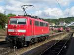 BR 111 Lokportraits Br.111 080-8 im G�terberiche des Bahnhofes Ulm Hbf. Im Hintergrund, zwei Loks der Br.218. Aufgenommen am 30.Juli 2007
