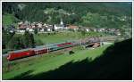 br-1016 OEC 668 'Fachhochschule Vorarlberg' am 25.7.2007 von Graz auf dem Weg nach Bregenz, aufgenommen in Flirsch. Die Rosana, die der Zug hier gerade �bersetzt, hat im Augusthochwasser 2005 so starke Sch�den angerichtet, dass die Arlbergstrecke bis 13.12.2005 gesperrt werden musste. Bespannt wurde der Zug mit einer 1016, den Rest der Nummer kann ich leider nicht mehr identifizieren.