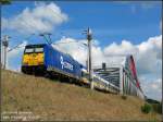 Veolia 146 521 schiebt X80003 Leipzig Hbf - Warnem�nde �ber die Elbebr�cke bei Lutherstadt Wittenberg, 01.08.07. Der Tf hatte wohl vergessen den Zielanzeiger an der Lok vor Abfahrt umzustellen: 'Nicht Einsteigen' ermuntert wohl nicht zu einer Fahrt an die Ostsee.