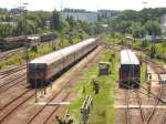 BR 628 <-> 928 | 629 Blcik von der Stra�enbr�cke am Villinger Bahnhof: Rechts 928 336-7 und links 11 062-6 mit ihrem Fu�ballsonderzug 5.8.07 