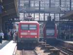 BR 112 BR 112 182-1 (Links) als RE1 nach Frankfurt (Oder) und Rechts bei der Ausfahrt aus Berlin Zoologischer Garten der RE7 nach Dessau Hbf. Aufgenommen am 05.08.07