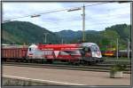 Bundesheer Taurus 1116-246 fährt mit einem Holzzug in den Bahnhof ... Bundesheer Taurus 1116-246 fährt mit einem Holzzug in den Bahnhof ...