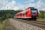 Nachschuss des 425 806-7, der hier am Kilometer 71,5 der ...