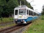 Triebwagen 15 fährt nach Garmisch-Partenkirchen zwischen den Haltestellen Kreuzeck-Alpspitzbahn und ... Triebwagen 15 fährt nach Garmisch-Partenkirchen zwischen den Haltestellen Kreuzeck-Alpspitzbahn und ...