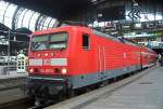 Der RE33009 steht abfahrbereit in Richtung Rostock im Hamburger Hbf.(18.07.04) ...