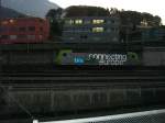 Eine Re 485 mit leuchtendem Schriftzug im letzten Abendlicht in ... Eine Re 485 mit leuchtendem Schriftzug im letzten Abendlicht in ...
