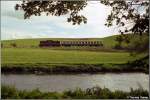 ex-kbs-527-chemnitztalbahn Eine Lok der BR 202 ist mit ihrem Ein-Wagen-Zug im August 1997 auf der Chemnitztalbahn unterwegs. Hier aufgenommen auf dem Abschnitt zwischen Markersdorf und Umspannwerk K�thensdorf.