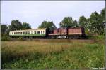 202 591 ist mit ihrer Ein-Wagen-RB an einem Augustabend 1997 ...