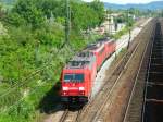 Eine Br 185 die 2 Br140 abschleppt. Zwischen Haltingen und ...