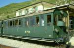 SPB Schynige-Platte-Bahn SPB - B 31 am 05.08.1994 in Schynige Platte - 2.Klasse Personenwagen 4-achsig - Baujahr 1902 - vRoll - Gewicht 7,20t - Sitzpl�tze 46 - L�P 10,59m - zul�ssige Geschwindigkeit 25 km/h - �=13.02.1991 - Lebenslauf: ex WAB BC4 31 - 1956 AB4 31 - 1963 AB4 25 - 1964 B 25 - 1970 SPB B 31 - 2002 B 49 neuer Kasten.
