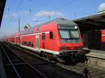 Ein RE am 24.03.2008 bei der Ausfahrt aus dem Augsburger ...
