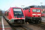 641 037-7 und 143 185-7 warten am 15.03.2008 in Gro�heringen ...