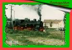 BR 94 BR 94 in Gr�fentonna, rechts alte DDR-Fahrzeuge. Aufnahme um 1996