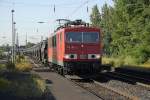 155 152 f�hrt mit einem niederl�ndischen Milit�rzug duch den Bhf ...