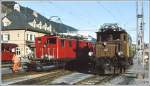 FO Furka-Oberalp-Bahn Am andern Streckenende der FO in Disentis/Must�r begegnet die HGe 4/4 I 33 der Ge 6/6 I 407 der RhB. (Archiv 12/82)