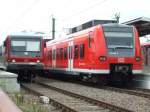 VT 928 272 und ET 425 stehen im Bahnhof Germersheim ...