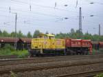 v-60-der-dr---br-105-106---br-345-346 EBW Cargo V60.05 mit Muldenkippwagen bei Rangierarbeiten in Bochum Ehrenfeld.(05.08.2008)