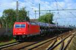 185 586 vor einem Autozug bei Hannover-Linden  ...
