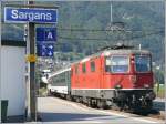 re-4-4-ii-re-420 Re 4/4 II 11144 mit RheintalExpress aus St.Gallen nach Chur f�hrt in Sargans ein. (27.08.2008)