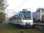 14WE-02 als ehemalige Linie S1 in Warszawa Falenica, 21.10.2006  ...