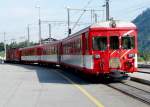 FO Furka-Oberalp-Bahn MGB - Pendelzug mit ABt 4182 und 2 Personenwagen 2 Kl sowie dem Zahnradtriebwagen Deh 4/4 94 in Disentis am 21.09.2008