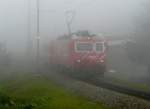 FO Furka-Oberalp-Bahn MGB - GLACIER EXPRESS mit Lok HGe 4/4 107 im Nebel bei der einfahrt in Andermatt am 21.09.2008