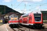 baden-wurttemberg Generationenvergleich im Bahnhof von Geislingen (Steige):
Links ein Karlsruher Kopf an einer Regionalbahn nach Stuttgart, rechts ein Doppelstocksteuerwagen an einem Regionalexpress nach Ulm. Die Aufnahme entstand am 13. August 2008.