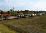 br-185-private 241.002-3 am 3.10.08 mit Autozug auf der Ostumfahrung des Rbf.   Halle/ Saale.