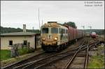 ST43-223 f�hrt aus dem Bf Wałowice mit einem Autoteilezug nach ...
